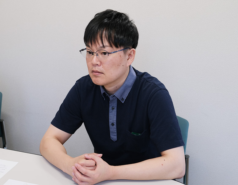 業務・システム管理部 課長 佐藤 桂一 様